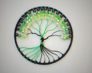 shades of green make this 6 inch tree of life suncatcher stand out. hocus pocus witchy style perferct for the Halloween and Samhein season